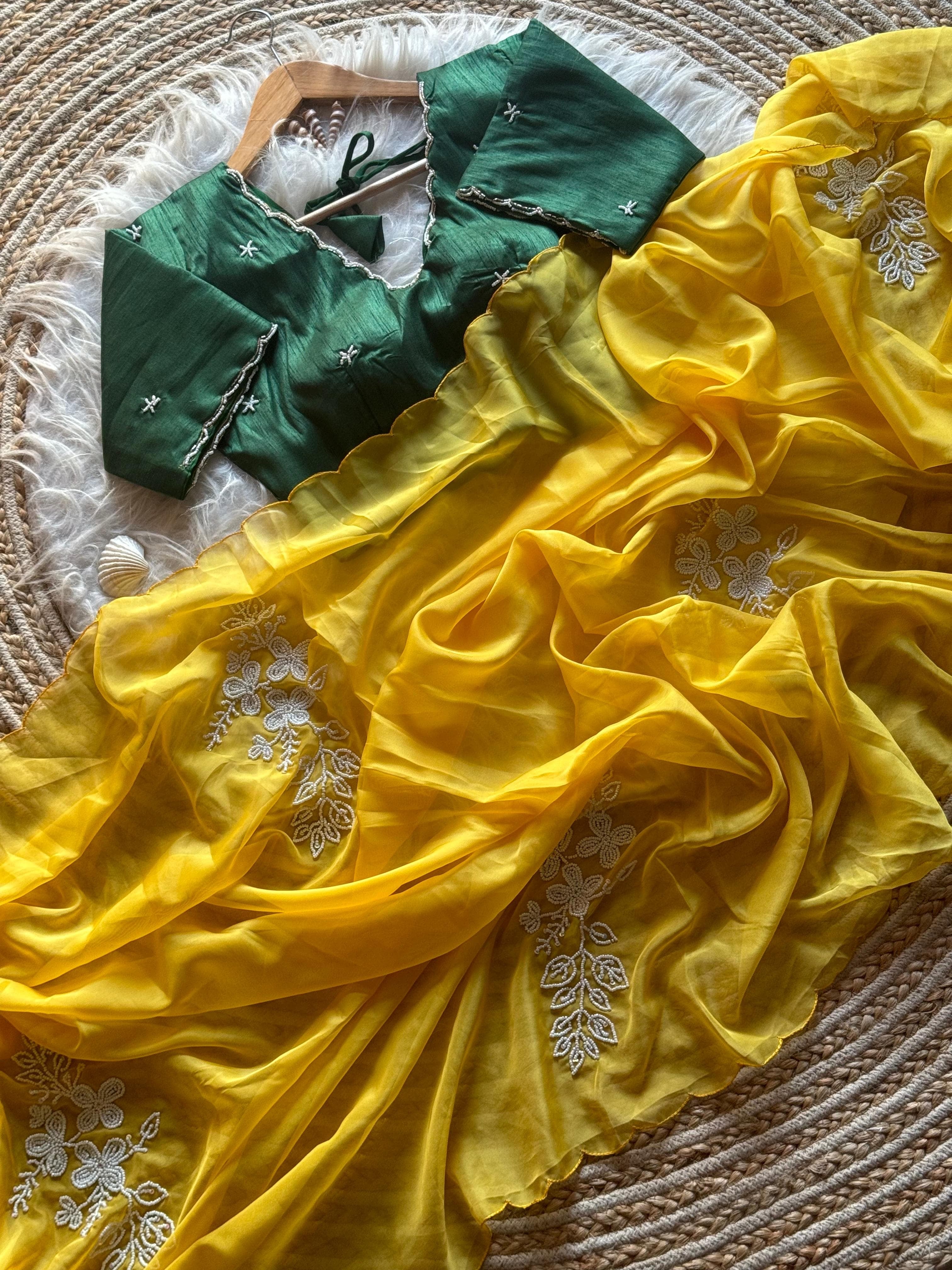 Pearls on yellow Saree